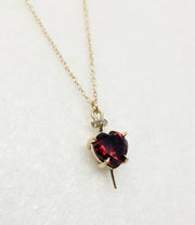 Nail Through The Heart Gold Necklace with Garnet