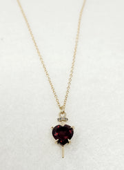 Nail Through The Heart Necklace with Garnet