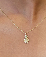 Skull with Emerald Necklace